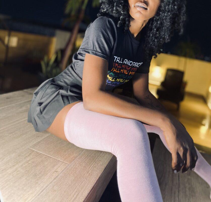 tall and proud black t-shirt with rainbow writing